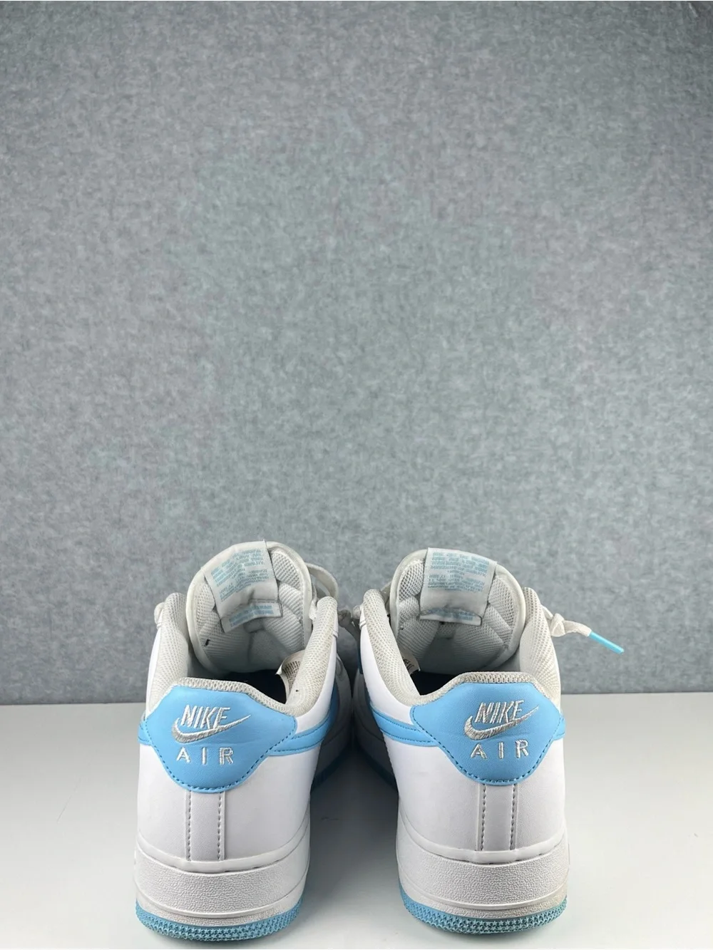Nike Low-Top White/ Light Blue Sneakers with Light Blue Swoosh